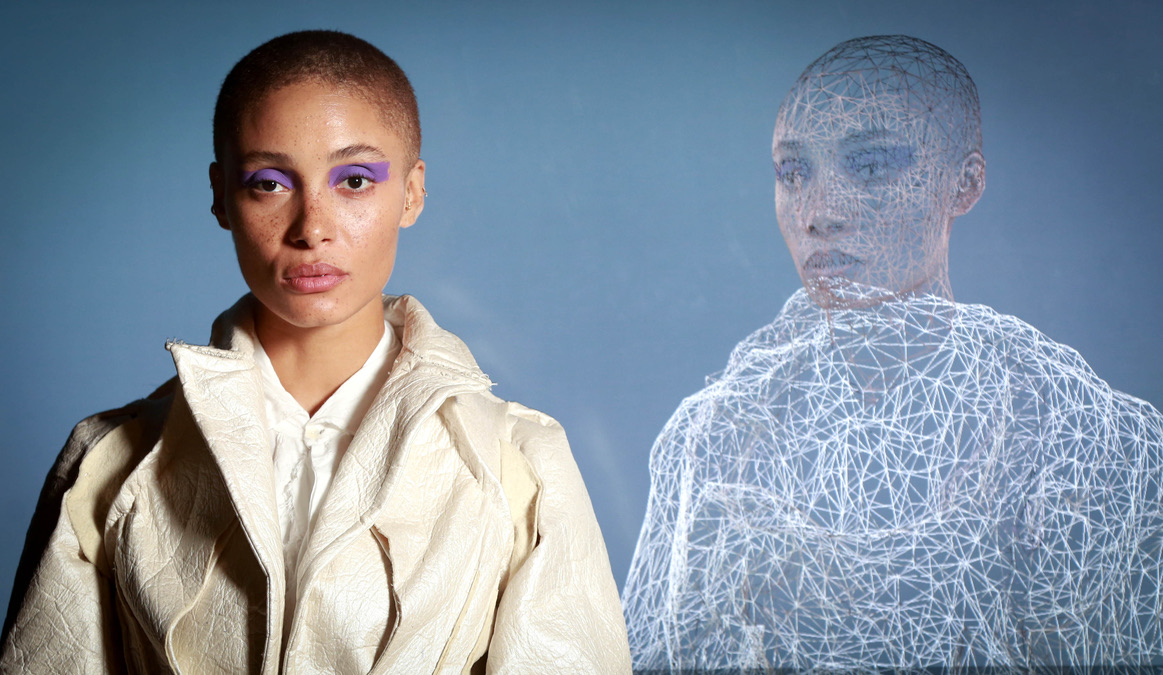 A model next to an animated version of themself